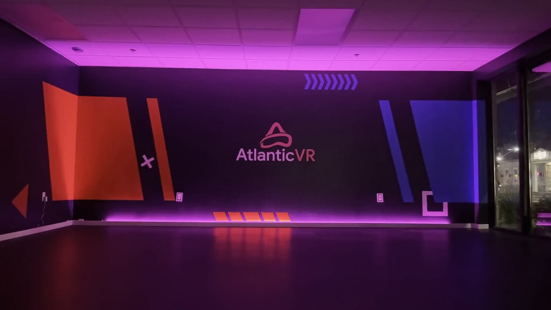 The AtlanticVR arena in Moncton under purple light